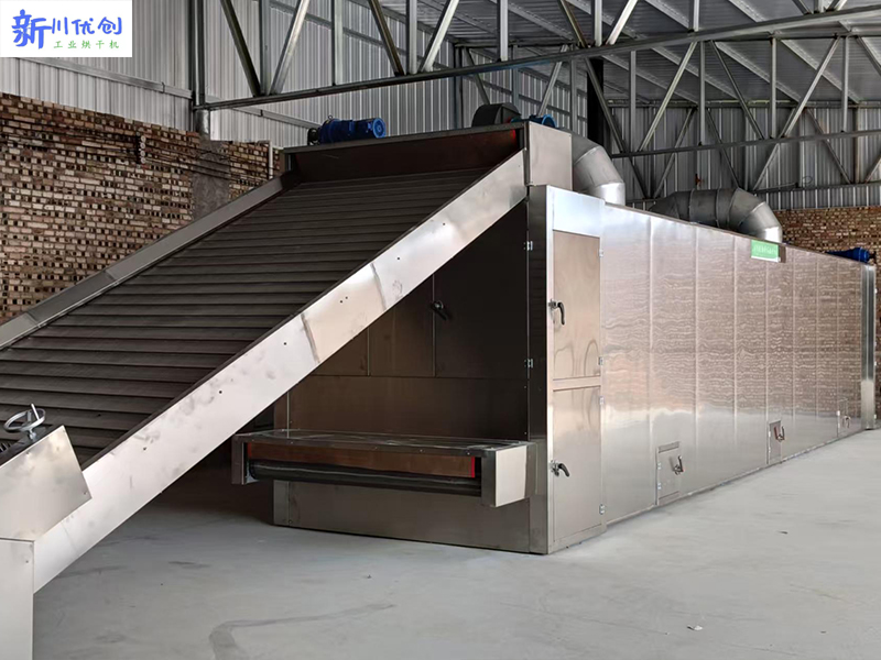 山西客戶訂購我廠一套生物質(zhì)網(wǎng)帶式烘干機